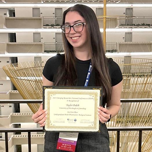 Taylor Podob receibed a certificate of achievement