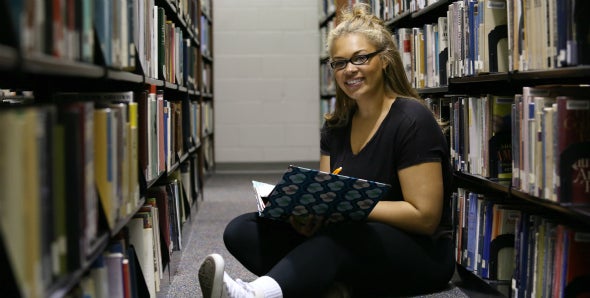Student in Millstein Library