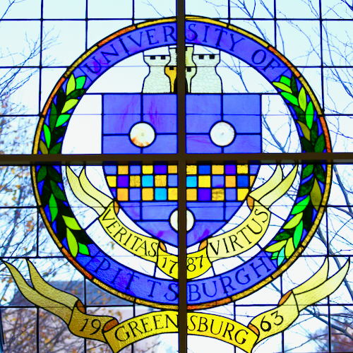 Stained glass seal of the University of Pittsburgh at Greensburg