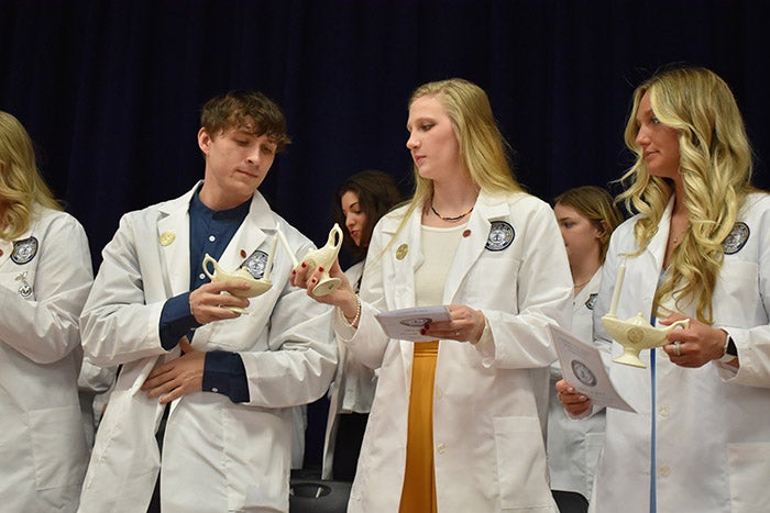 Graduating nurses Pass the Light