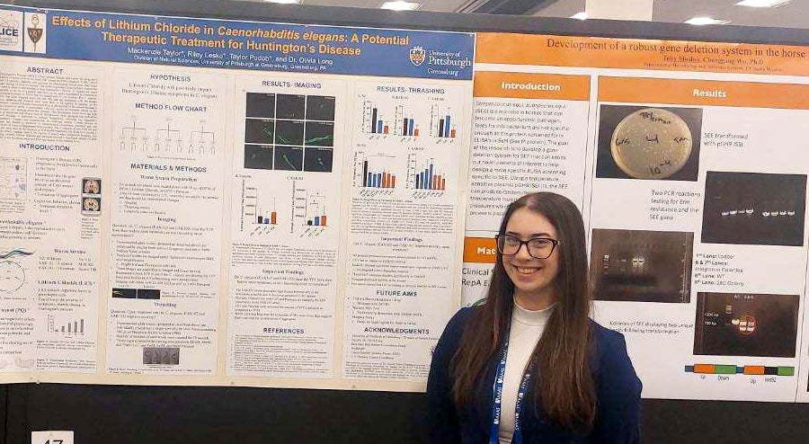 Taylor Podob with her poster presentation