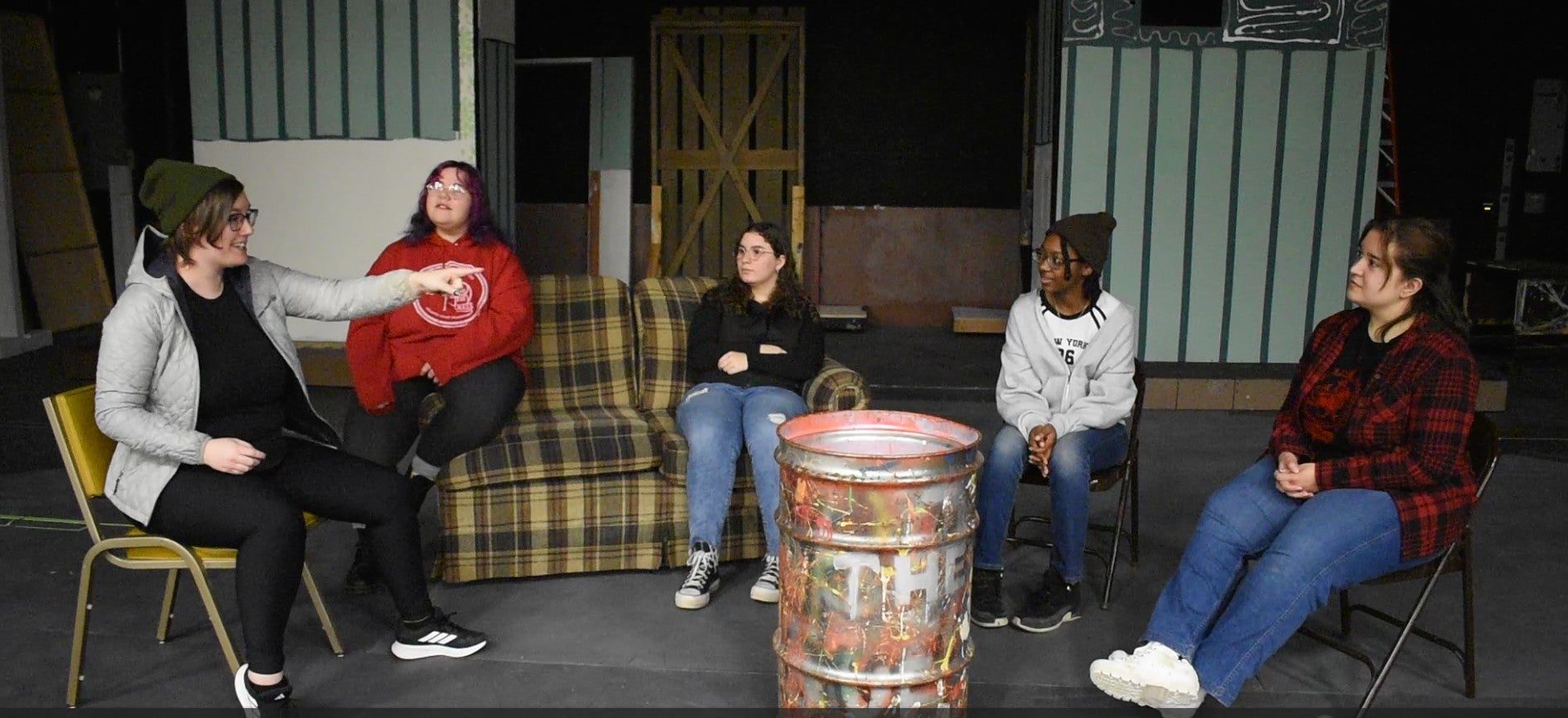 The cast of Mr. Burns rehearsing a scene