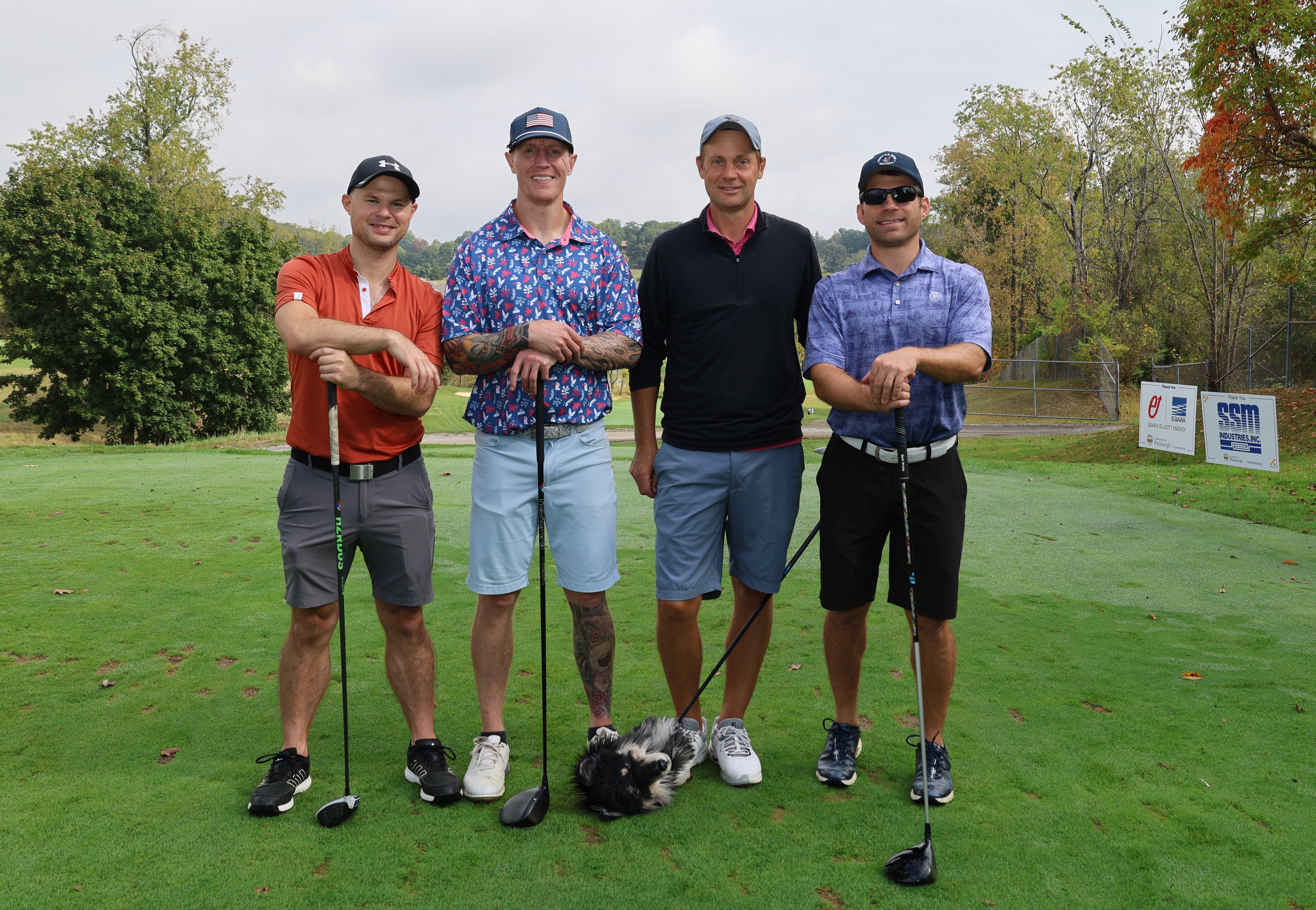 Four golfers