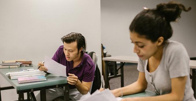 students talking in class