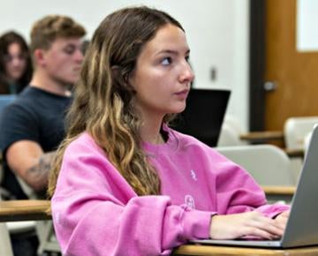 A student listens intently in class.