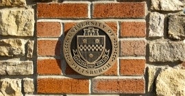 University of Pittsburgh seal on wall